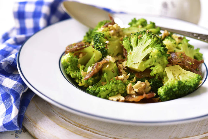 Steamed Broccoli with True Orange Ginger Dressing and Walnuts