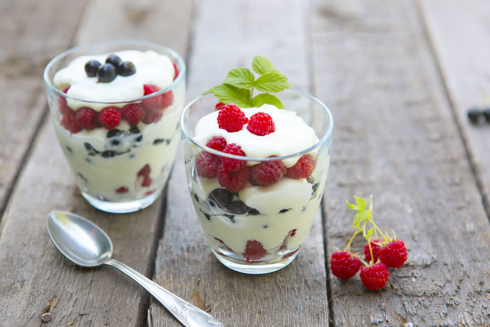 Creamy True Lemon and True Lime summer berry parfait in a glass