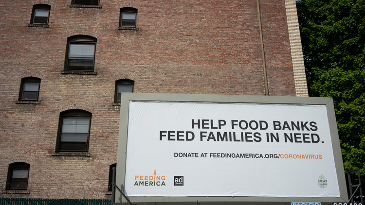 A Feeding America Billboard that reads 
