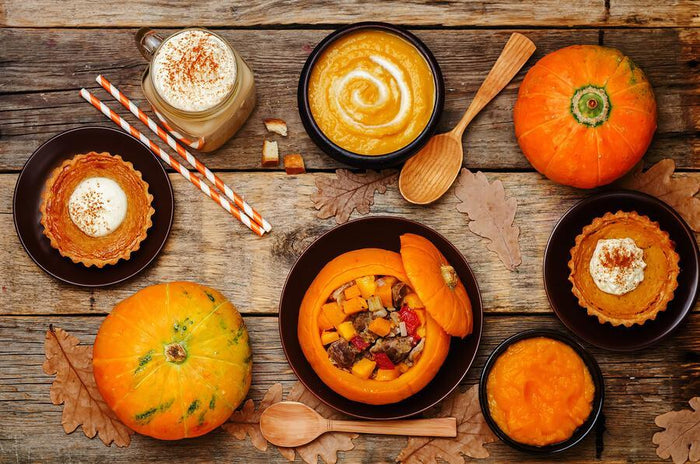 assorted fall foods on a wooden table