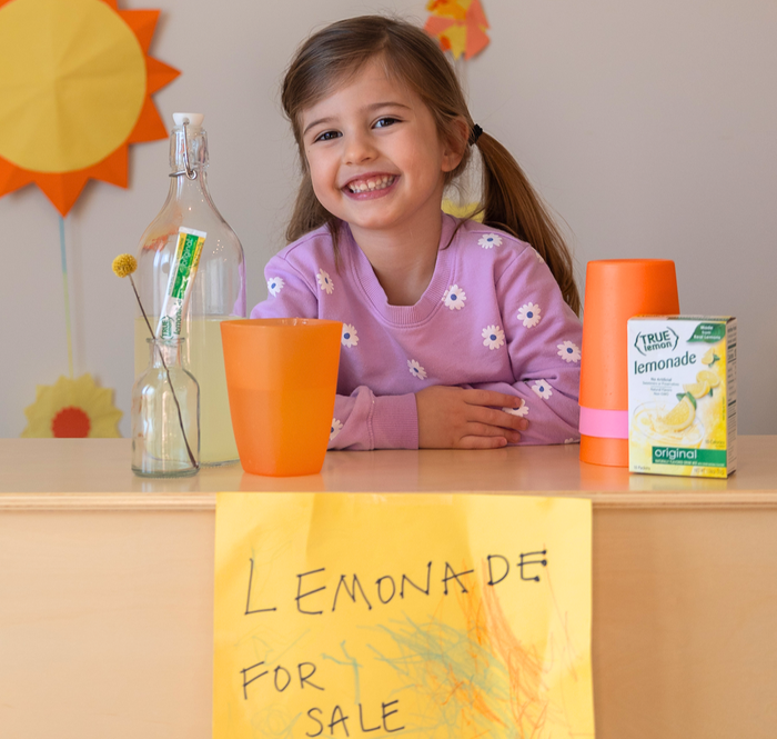 Girl at her lemonade stand